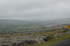 Karst pavements and topography of the Burren approx 5km south of Ballyvaughan Co Clare Ireland. Exposures of the Dinantian Burren Limestone Formation are composed of shallow water carbonates. Note the clints (limestone blocks) and grikes (joints formed by Variscan folding (Coller, 1984) and fracturing) enlarged by Pleistocene disolution (Williams, 1966).